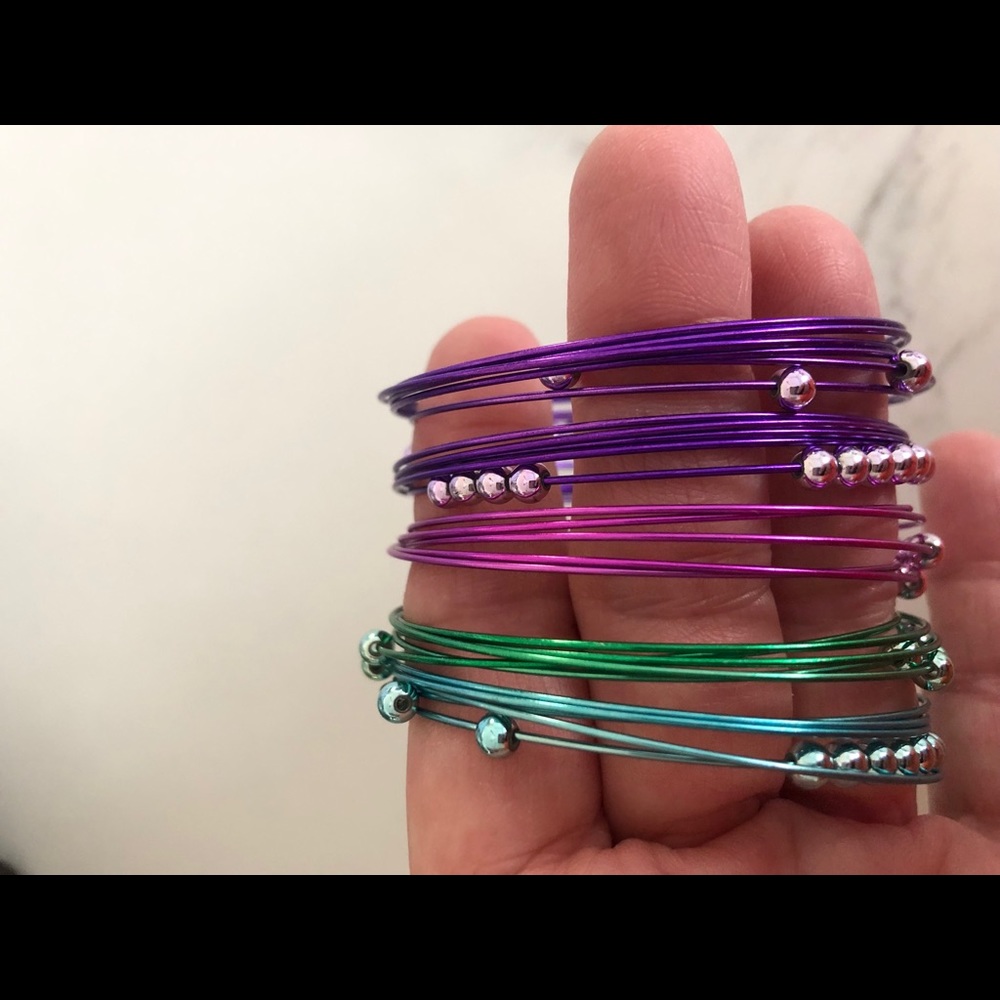 NWOT 5 metal bracelets w/matching metal ball beads
